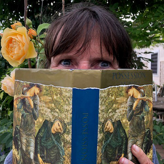 Donna, holding her book recommendation, Possession