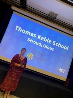 Picture of Lisa Winnington announcing Thomas Keble School as winners of The award for OCR GCSE Citizenship Studies School of the Year